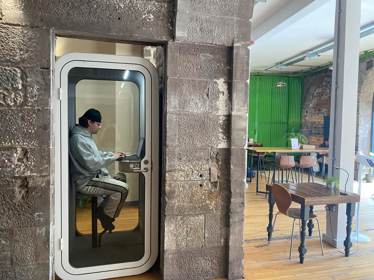 A private phone booth on the coworking floor